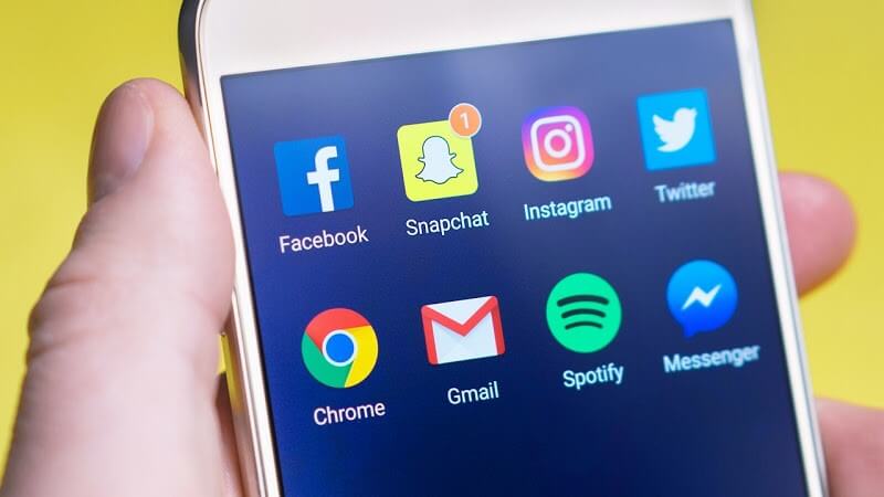 Cell phone with social media apps - Facebook, Snapchat, Instagram, and more.