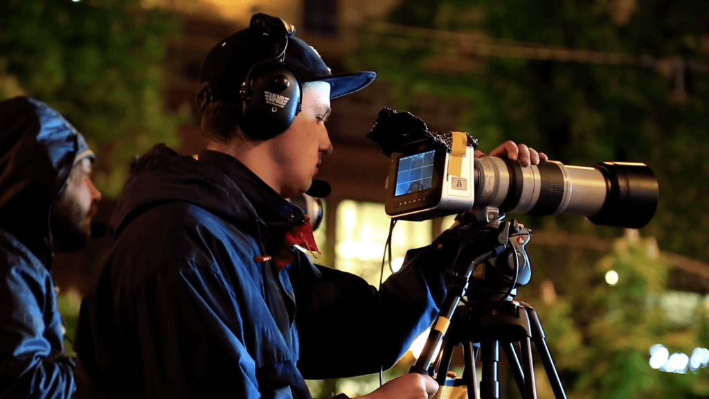 Cameraman filming a business video