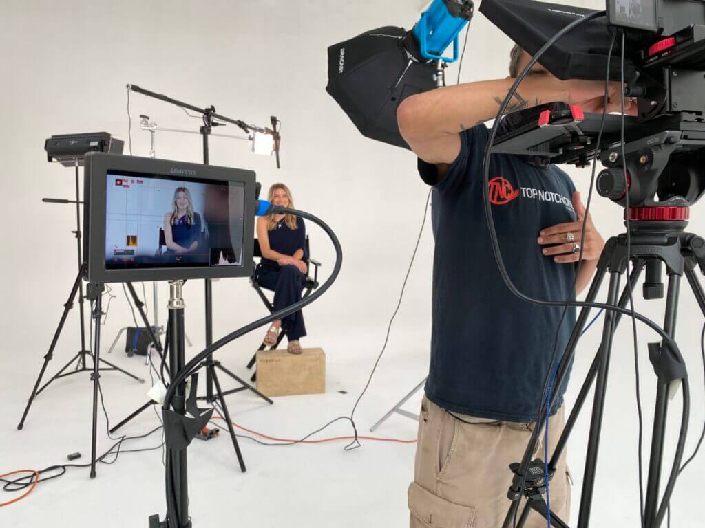 Man preparing to film in a studio setting