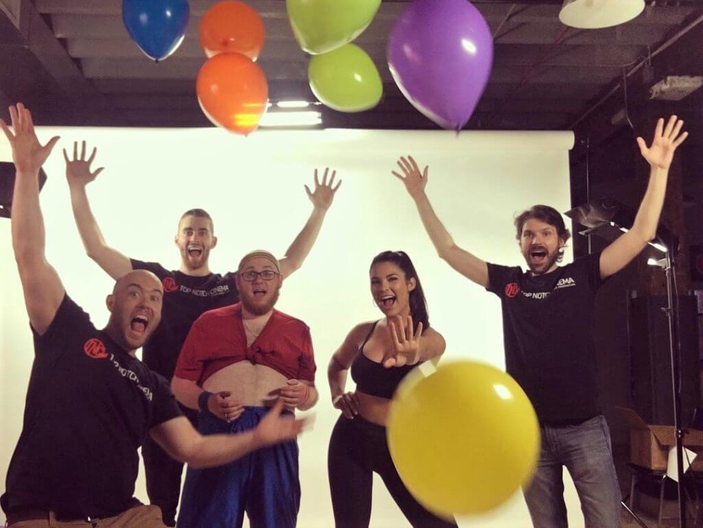 Film Crew with Actors and Balloons
